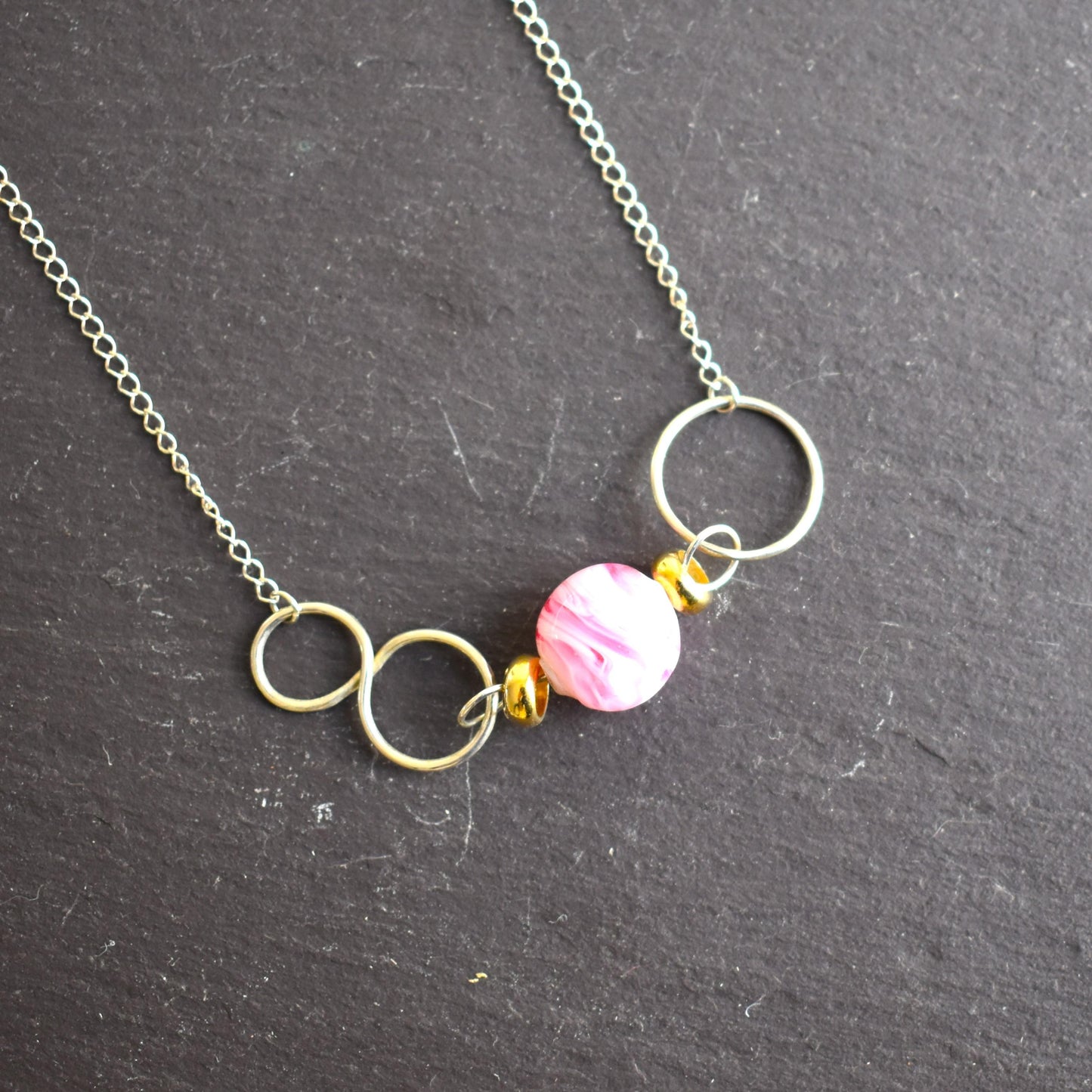 Pink bead necklace with silver loops