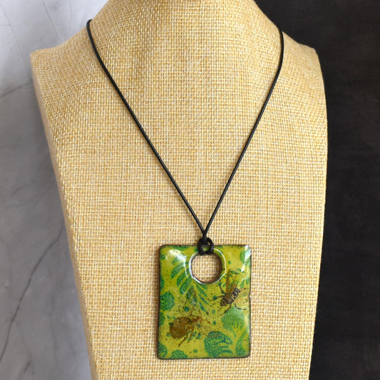 Enamelled copper pendant - green leaf design