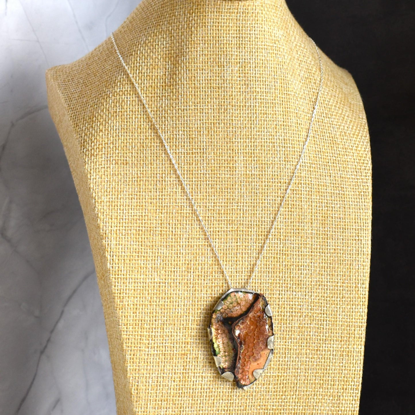 Golden foldform oval copper pendant necklace