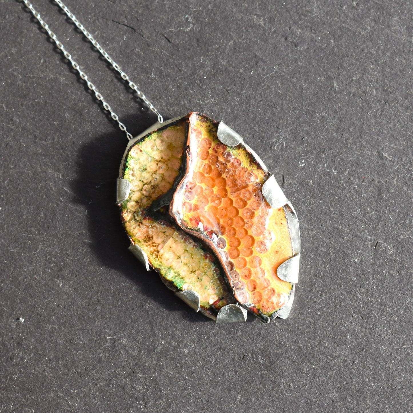 Golden foldform oval copper pendant necklace