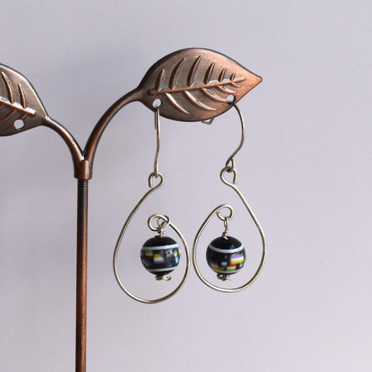 Silver wire motif earrings with coloured bead